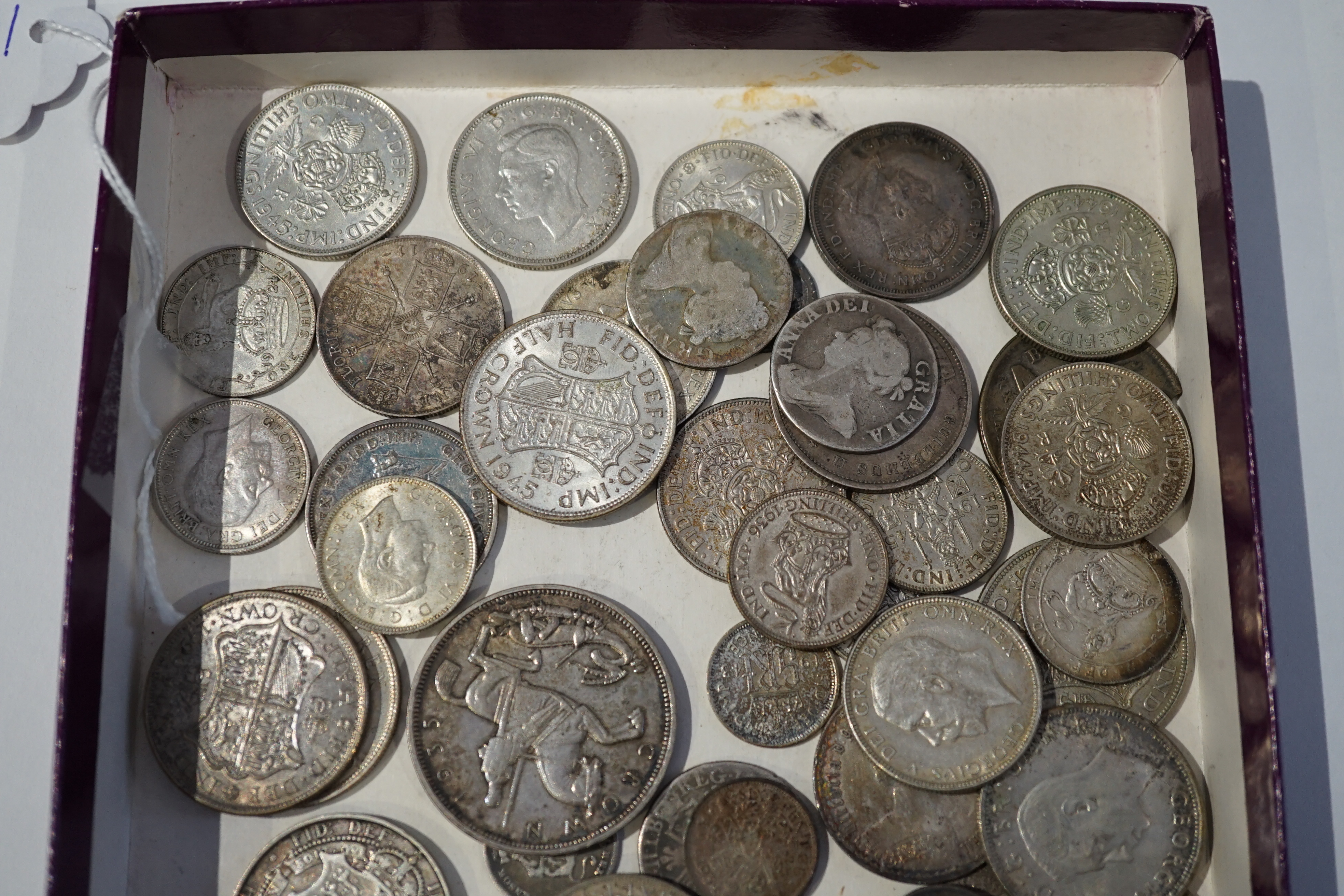 British silver coins, Anne to George VI, highlights include 1935 crown, two Anne shillings, various halfcrowns, florins and shillings and threepence coins, many VF or better, together with a George III 1775 Halfpenny, Ge